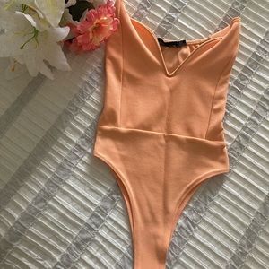 Peach corset body suit